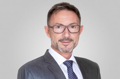 Portrait photo of  Joël Eschbach, Regional Head of Sales for Corporate Clients Basel